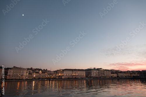Reflections on the sea of Trieste at dusk - Historical buildings and lights © Nicola Simeoni