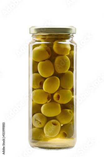 Green olives in a glass jar isolated on white background