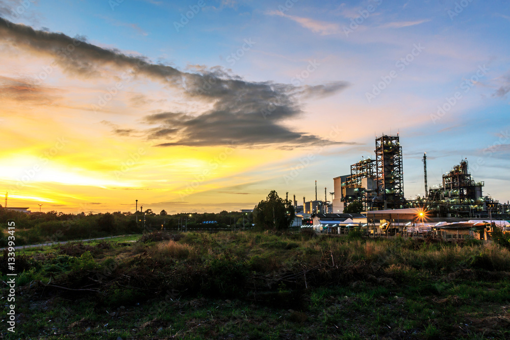 Fototapeta premium Petrochemical plant, oil refinery factory with Twilight