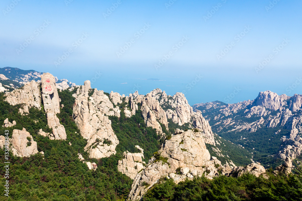 Laoshan Mountain, Jufeng trail during Autumn, Qingdao, China. Jufeng is the highest trail in Laoshan, where visitors can enjoy beautiful aerial views of the landscape