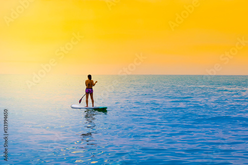 Woman is playing surf at sea © newroadboy