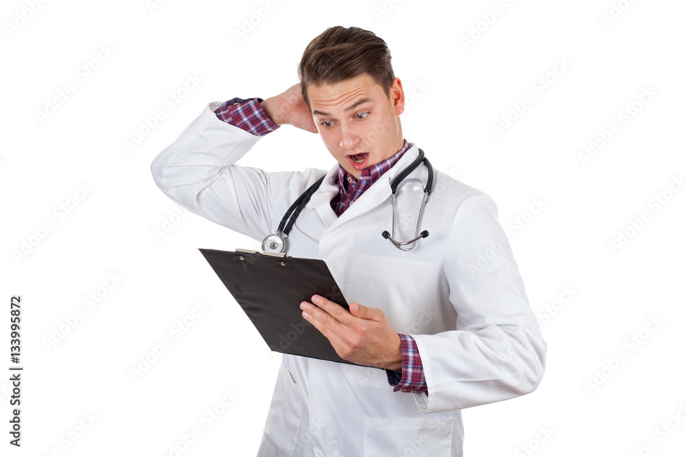 Young male doctor holding insurance forms Young male doctor holding insurance forms