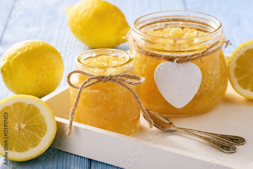 Homemade lemon jam in glass jars.