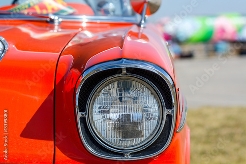 Closeup of old retro car headlight © Oleg Batrak