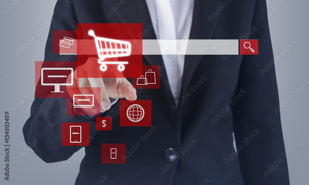 Φωτογραφία Online shopping concept of business woman hand touching shopping cart icon