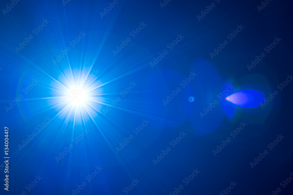 The blue light with flare and beam ray The blue light with flare and beam ray