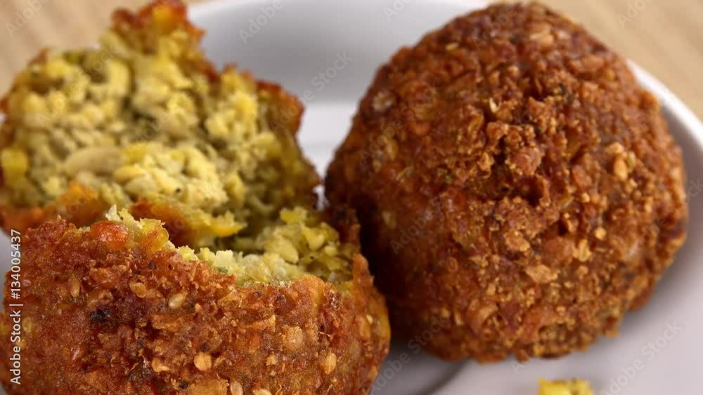 Fresh made Falafel (rotating) as seamless loopable 4K UHD footage) Fresh made Falafel (rotating) as seamless loopable 4K UHD footage)