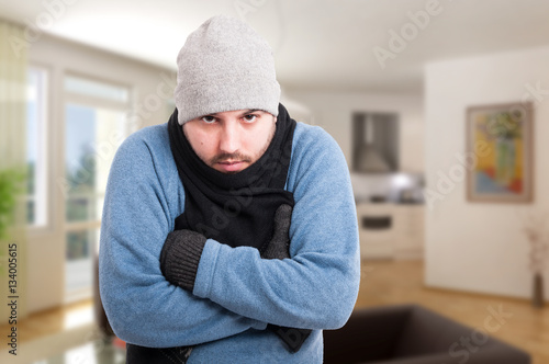 Wallpaper Mural Male in winter clothes inside the house Torontodigital.ca