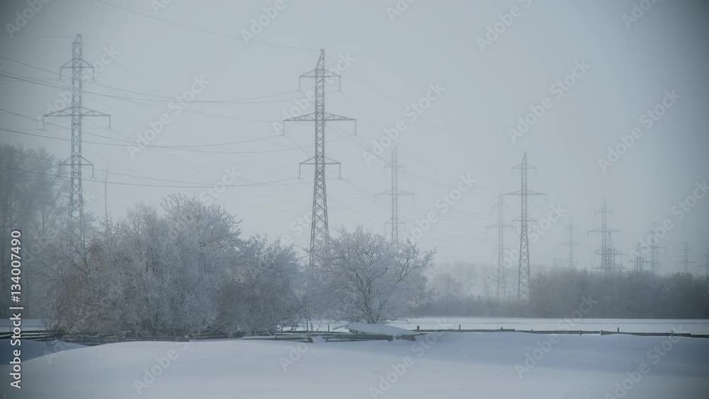 Big Electric Lines in Russian Village in Winter, Beautiful Winter, Branches Covered With Snow and Frost, Snowy Russian Steppe Big Electric Lines in Russian Village in Winter, Beautiful Winter, Branches Covered With Snow and Frost, Snowy Russian Steppe