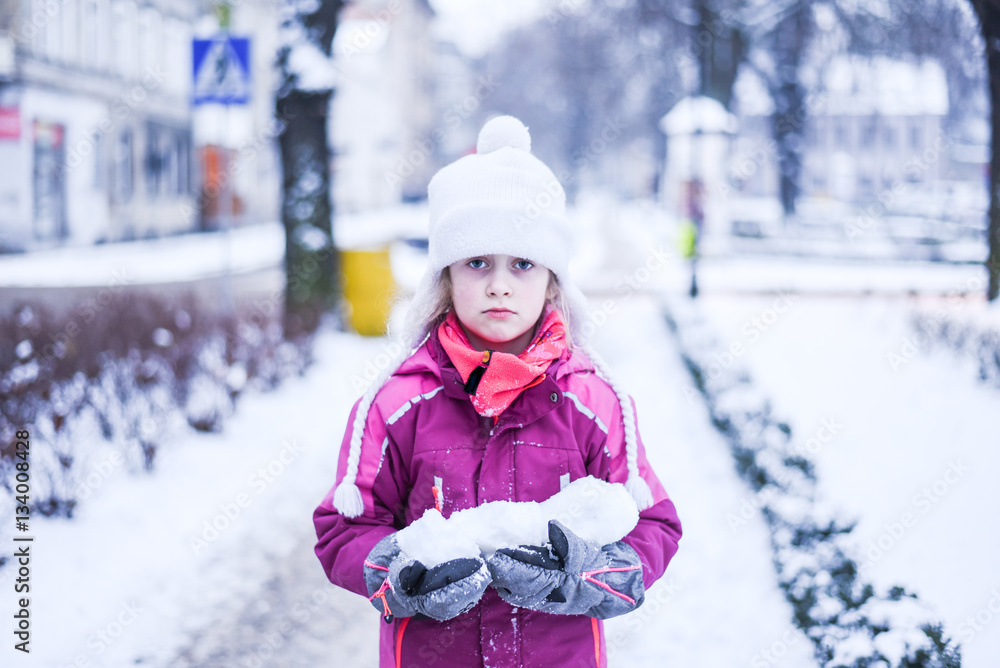 Girl with snowballs