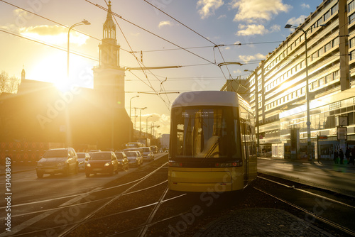 Photography Modern electric tram yellow color on the streets of Berlin