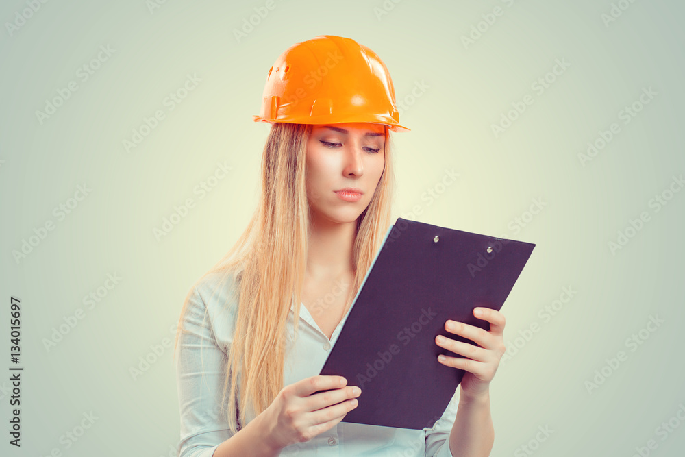 Architect thinking looking at notepad Architect thinking looking at notepad