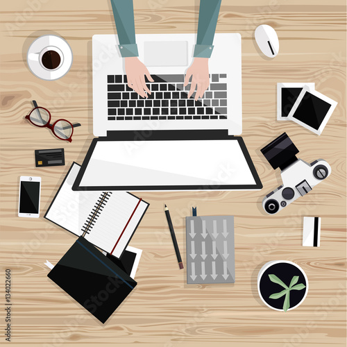 Desktop with isolated laptop, camera, notebooks, coffee, glasses, credit card, photos. Photographer's table. Top view. Wood background. Vector flat illustration. Freelance. Office work.