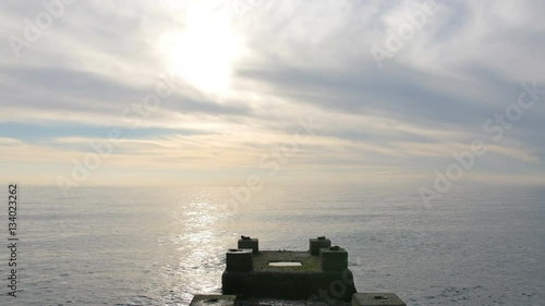 Concrete pier with scenery sea view at sunset