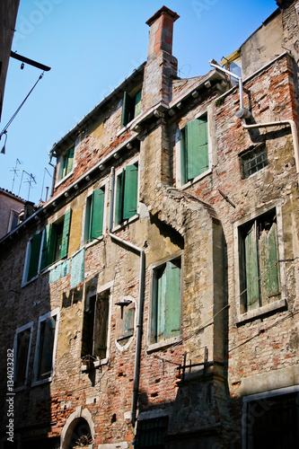 Dilapidated brick house on the outskirts of Venice, Italy. Away from the tourist routes.