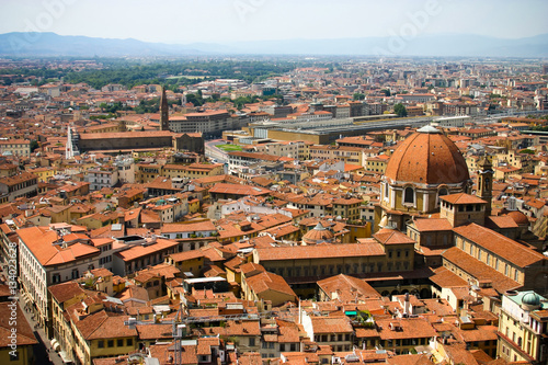 Florence from the observation deck of the dome of the Cathedral of Santa Maria del Fiore in Florence, Italy. View of the chapel of the Medici, Railway Station and the Basilica of Santa Maria Novella.