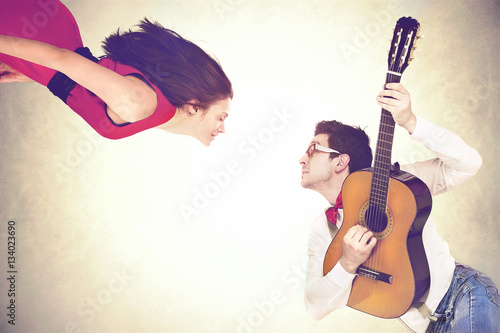 couples dancing together in the air to the sound of a romantic serenade photo