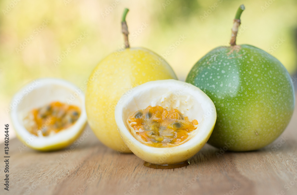 Passion fruits on wooden background,Fresh Passion fruit on on wooden background, Passion fruits on wooden background,Fresh Passion fruit on on wooden background,
