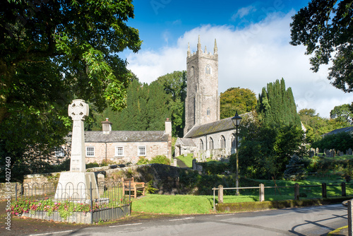 Church of St Nonna with the local war memorial, located in the picturesque village Altarnun in Cornwall.