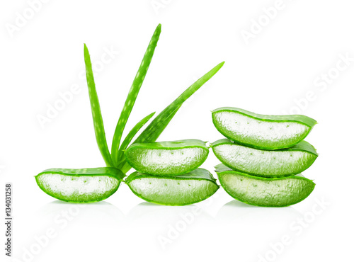 Fresh aloe vera leaf and slices with water drops isolated on whi