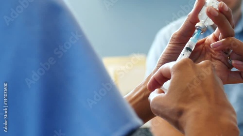 Series with doctors and patients in an exam room...Shot in 4K on the Lumix FZ1000.