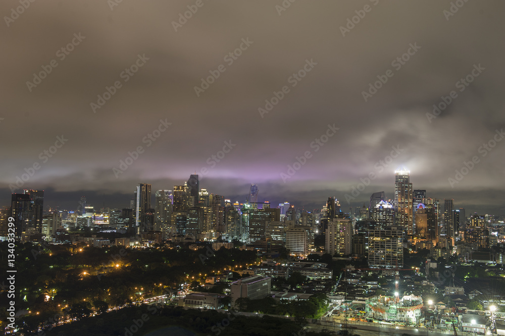 Aerial view of Bangkok city, under storm cloudy sky
