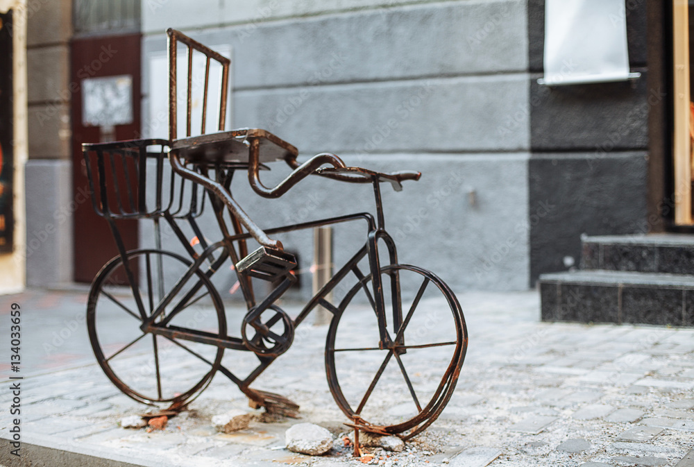 Vintage Retro old rusty bike on the street decorative