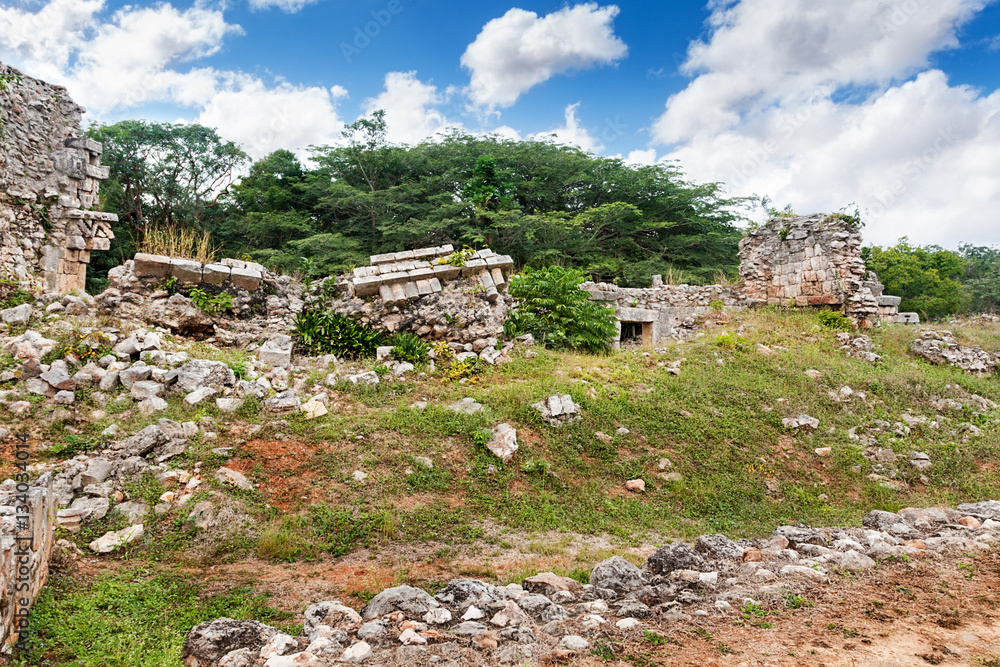 Collapsed Mayan ruins  beside vaulted arch, Labna, Mexico