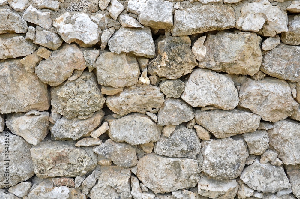 closeup of a stone wall for backgrounds closeup of a stone wall for backgrounds