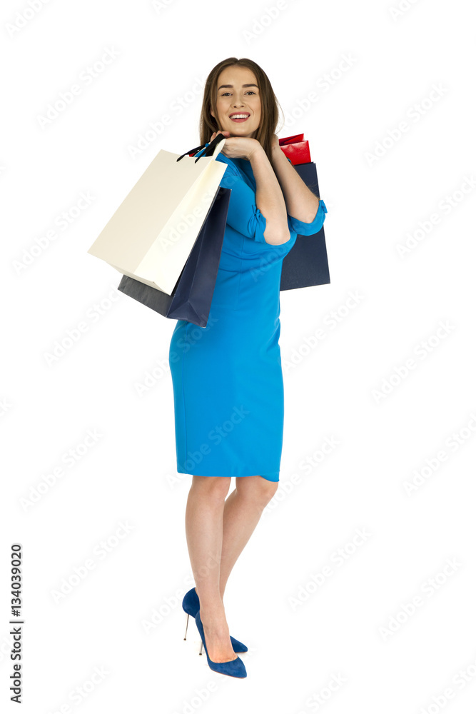 Shopping. Fashion young woman portrait isolated. Happy girl hold Shopping. Fashion young woman portrait isolated. Happy girl hold