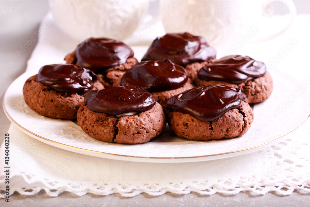 Chocolate surprise cookies with marshmallow filling on plate Chocolate surprise cookies with marshmallow filling on plate