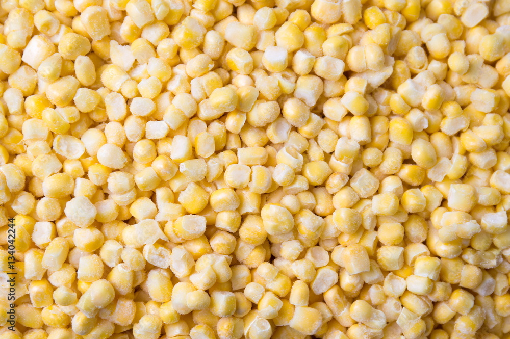 Frozen sweet corn forming background pattern Frozen sweet corn forming background pattern