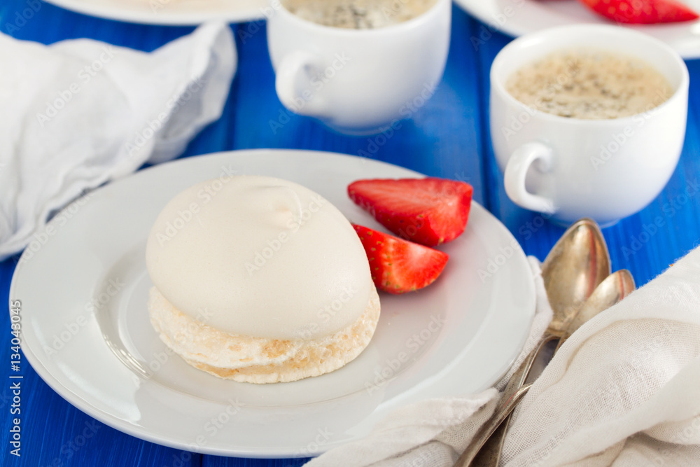 meringues on white plate meringues on white plate