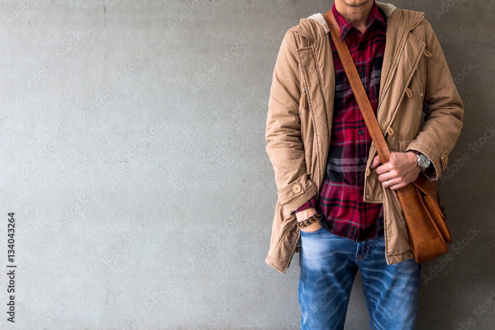 Father fage suck Inlay Men's casual outfits wear blue jeans with red plaid shirt, brown coat and  leather bag standing over gray grunge background with space, lifestyle  traveler, beauty and fashion concept Stock Photo | Adobe