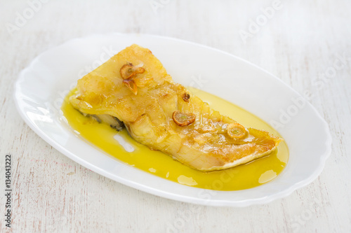 fried cod fish with garlic and olive oil