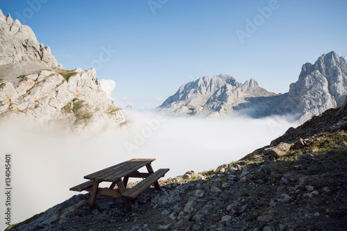 Sea of clouds in Picos de Europa. Collado Jermoso. Table resting on top of the mountains