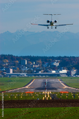 A business Jet landing at Zurich airport.