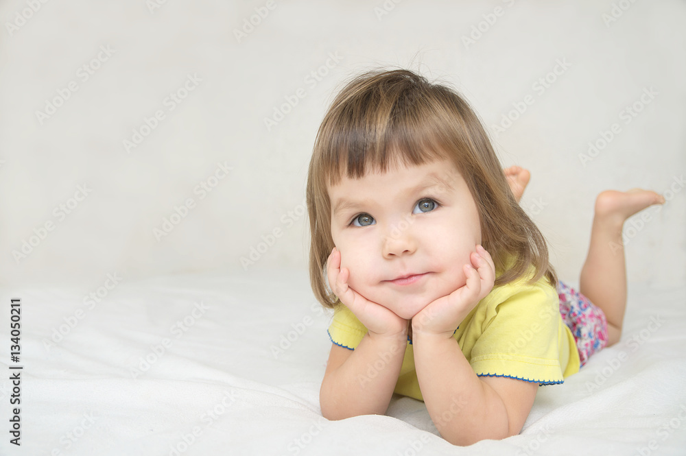 dreaming girl smiling happy lying in bed isolated, happy childhood concept, big dream come true, cute adorable child dreaming girl smiling happy lying in bed isolated, happy childhood concept, big dream come true, cute adorable child
