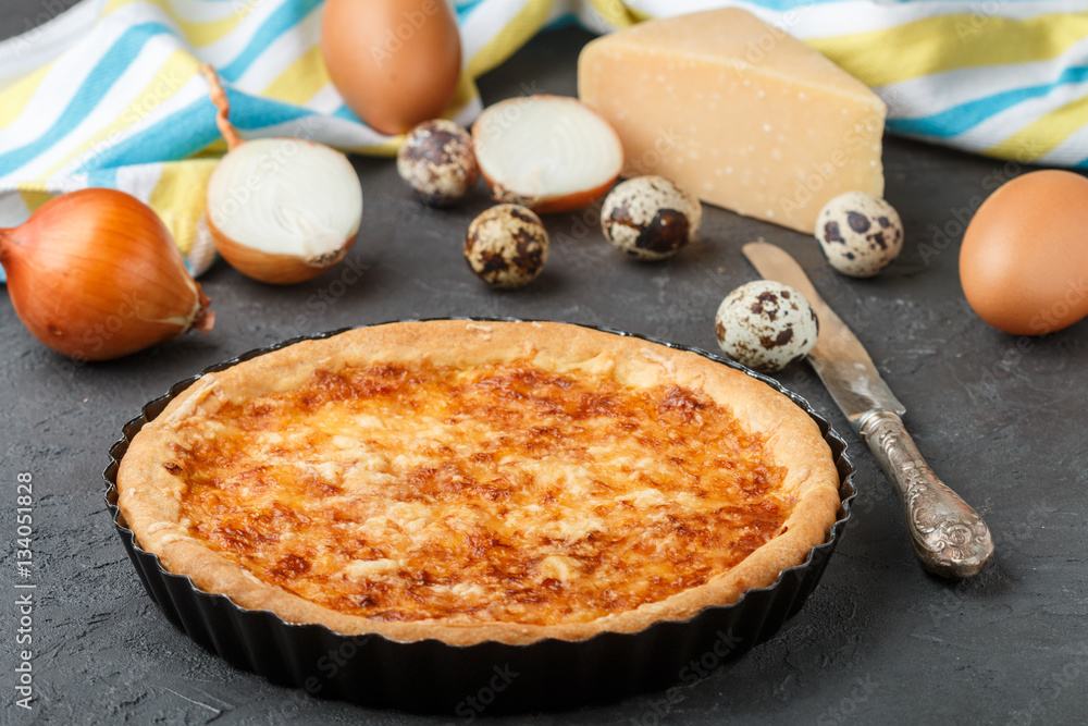 Homemade gourmet pie with cheese, onions and eggs
Homemade gourmet pie with cheese, onions and eggs