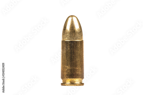 Sinle 9mm bullet isolated on white background photo