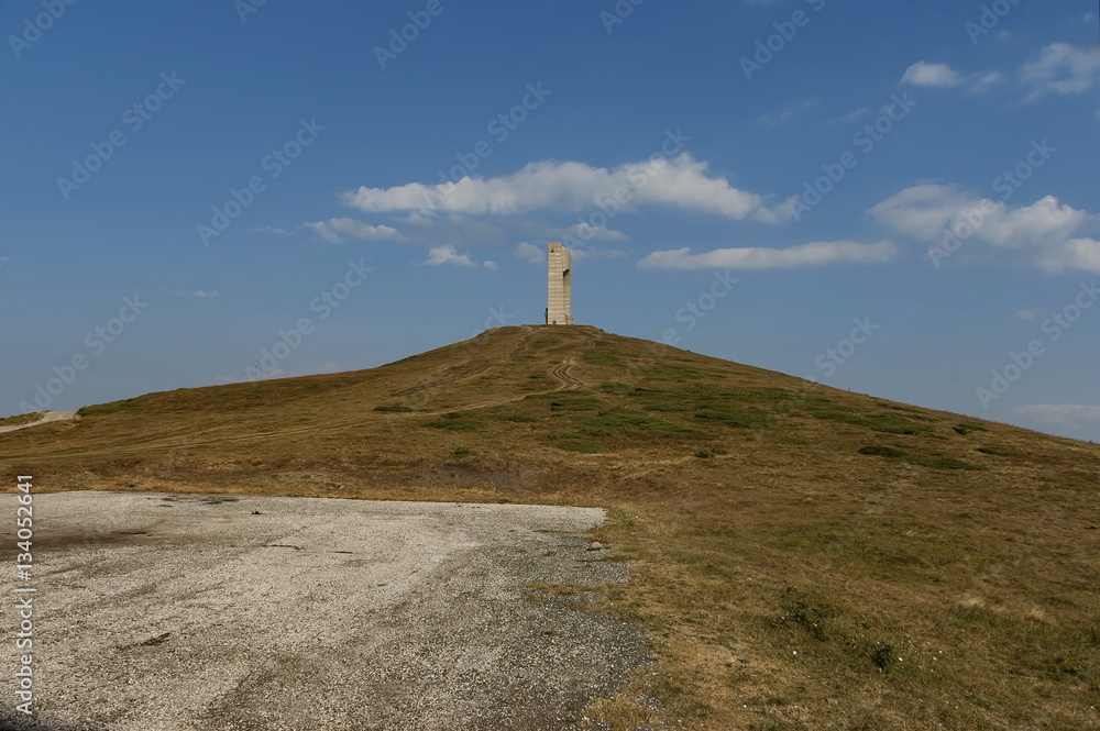 Mountain landscape with monument to the fallen of the war Central Balkan mountain, pass Beklemeto, Stara 

Planiana, Bulgaria 