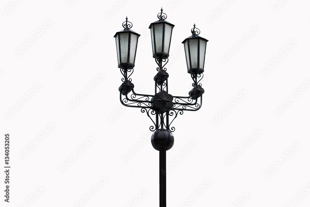 Street lighting poles isolated on white background Street lighting poles isolated on white background