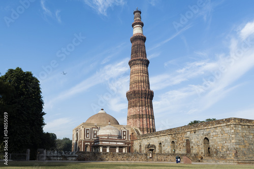 Qutub Minar and Alai Darwaza inside Qutb complex in Mehrauli, Delhi, India, Asia. photo