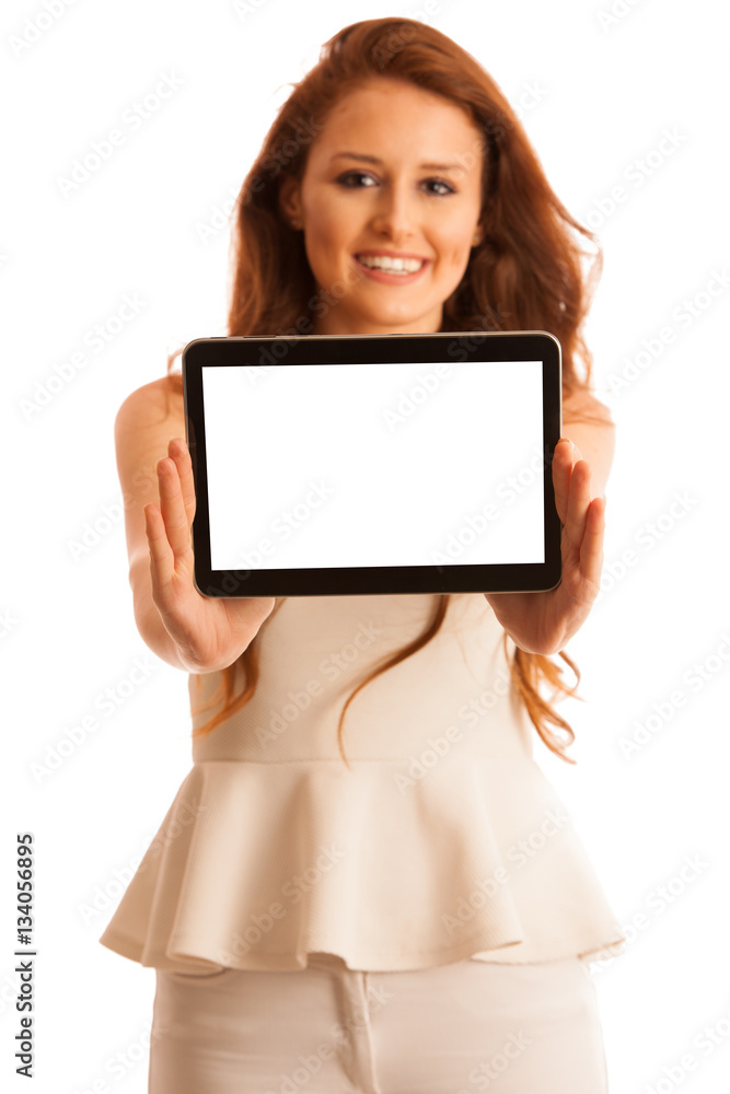 Business woman brousing the web on a tablet isolated over white Business woman brousing the web on a tablet isolated over white