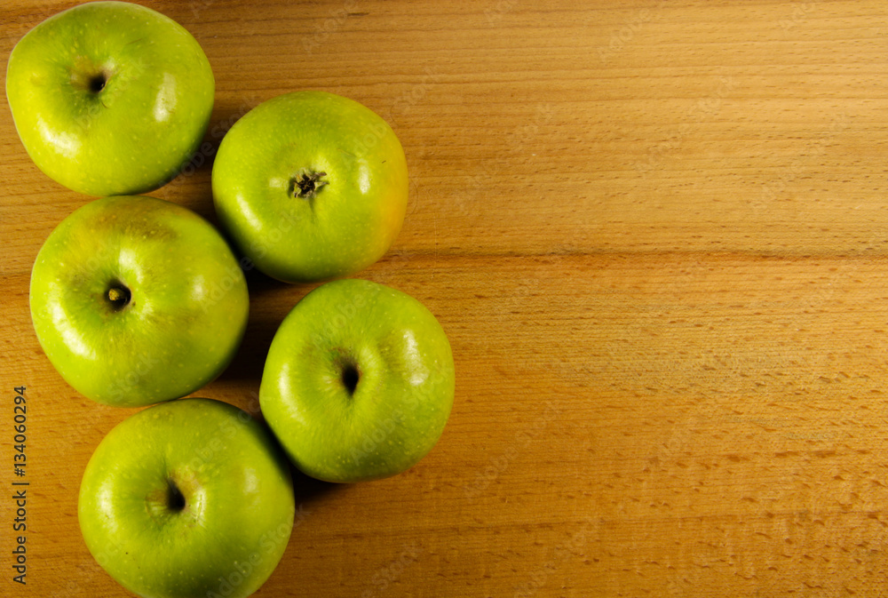Fresh green apples on wooden background Fresh green apples on wooden background