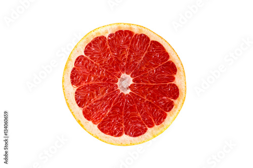 slice of juicy, contrast circle grapefruit isolated on white background