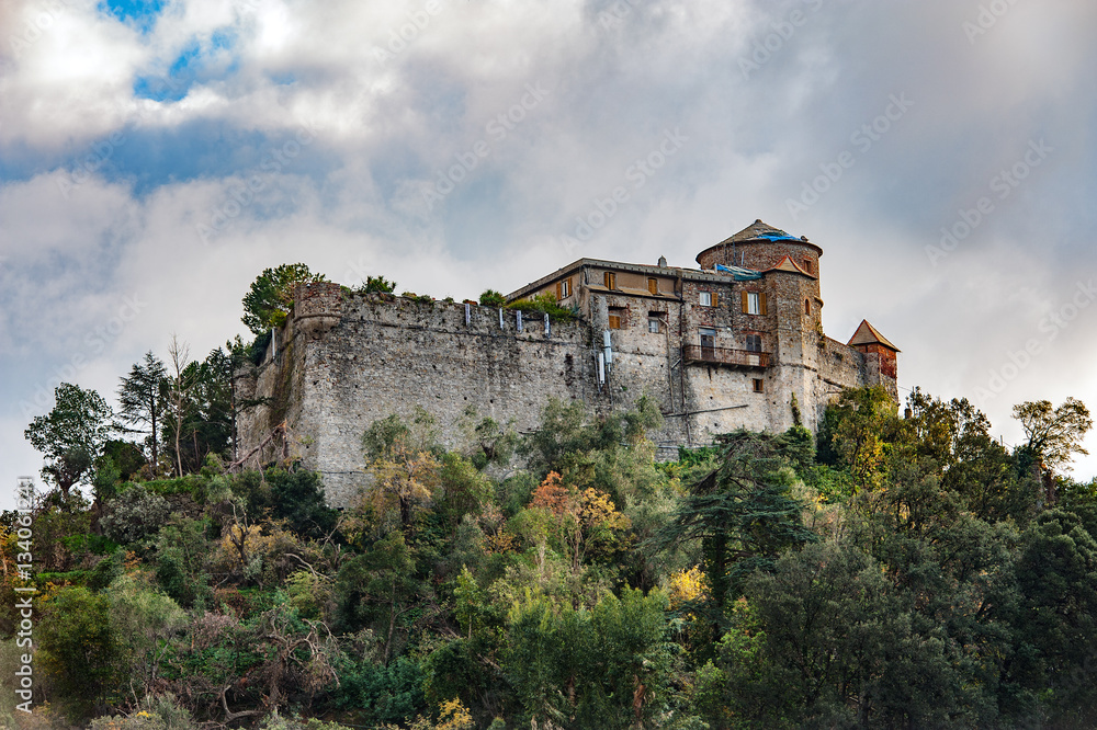 Old medieval castle, located on a hill near harbor of Portofino town, Italy
