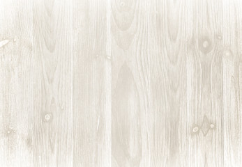 Old weathered wood surface with long boards lined up. Wooden planks on a wall or floor with grain and texture. Dark neutral tones with contrast.