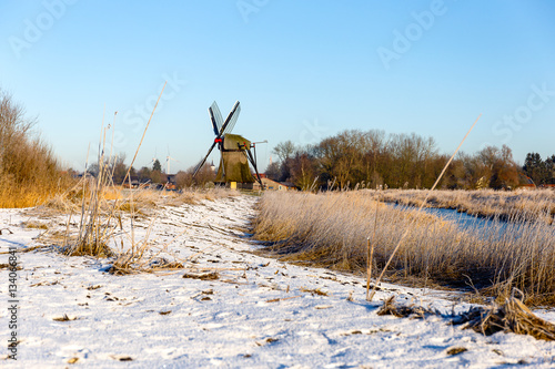 Windmill near Sande at cold winter morning photo