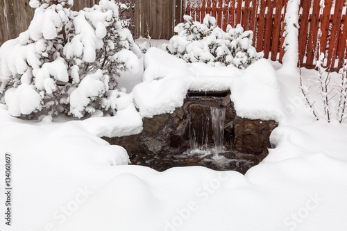Wallpaper Mural Snow covered outdoor water feature  after US northwest winter storm. Torontodigital.ca